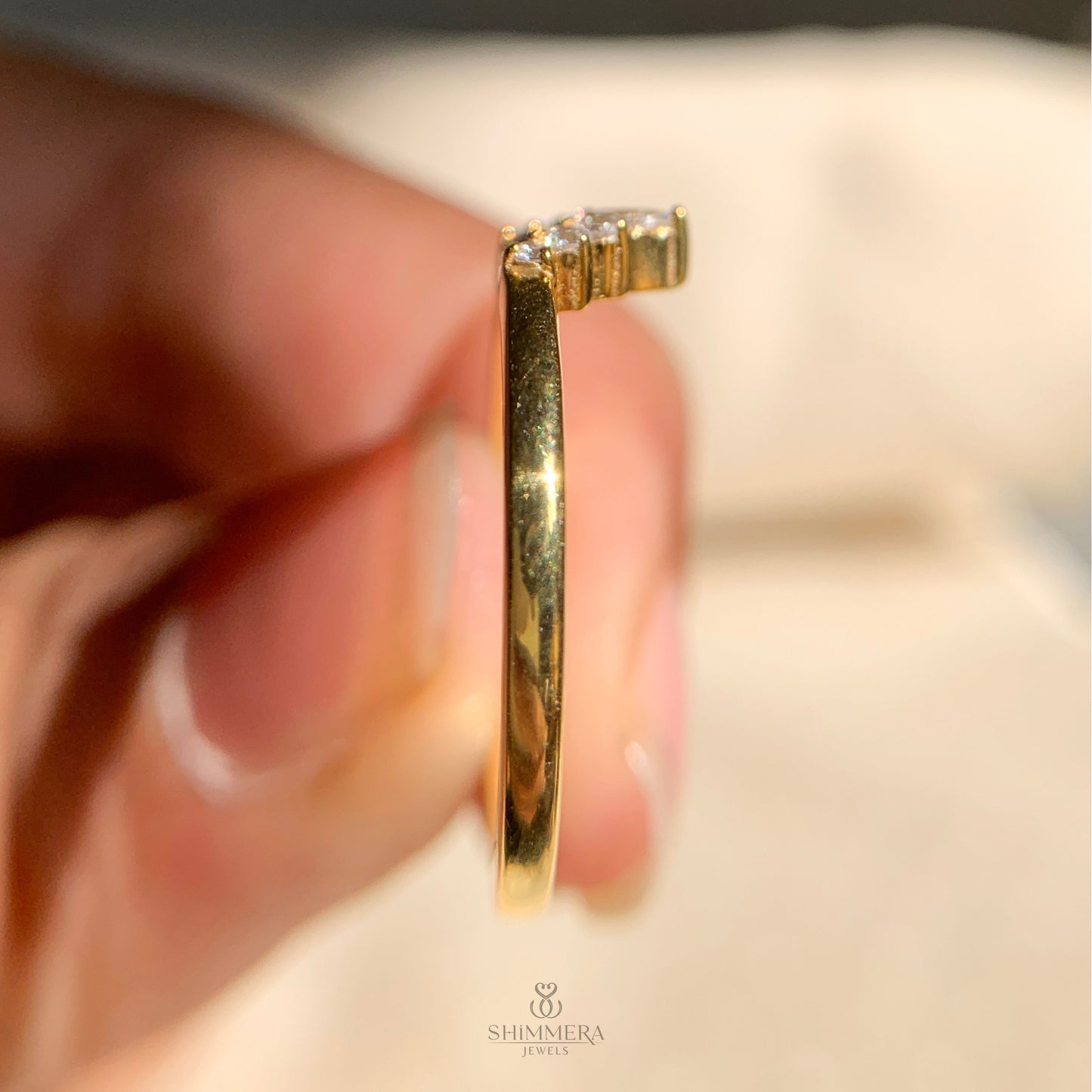 Traditional round cut diamond engagement ring in sleek prong setting