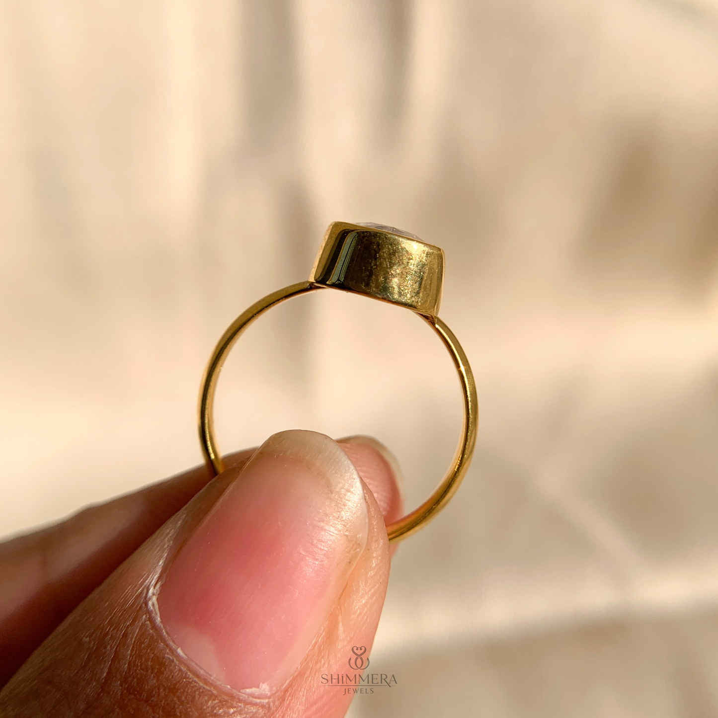 Half Bezel Pear Diamond Ring