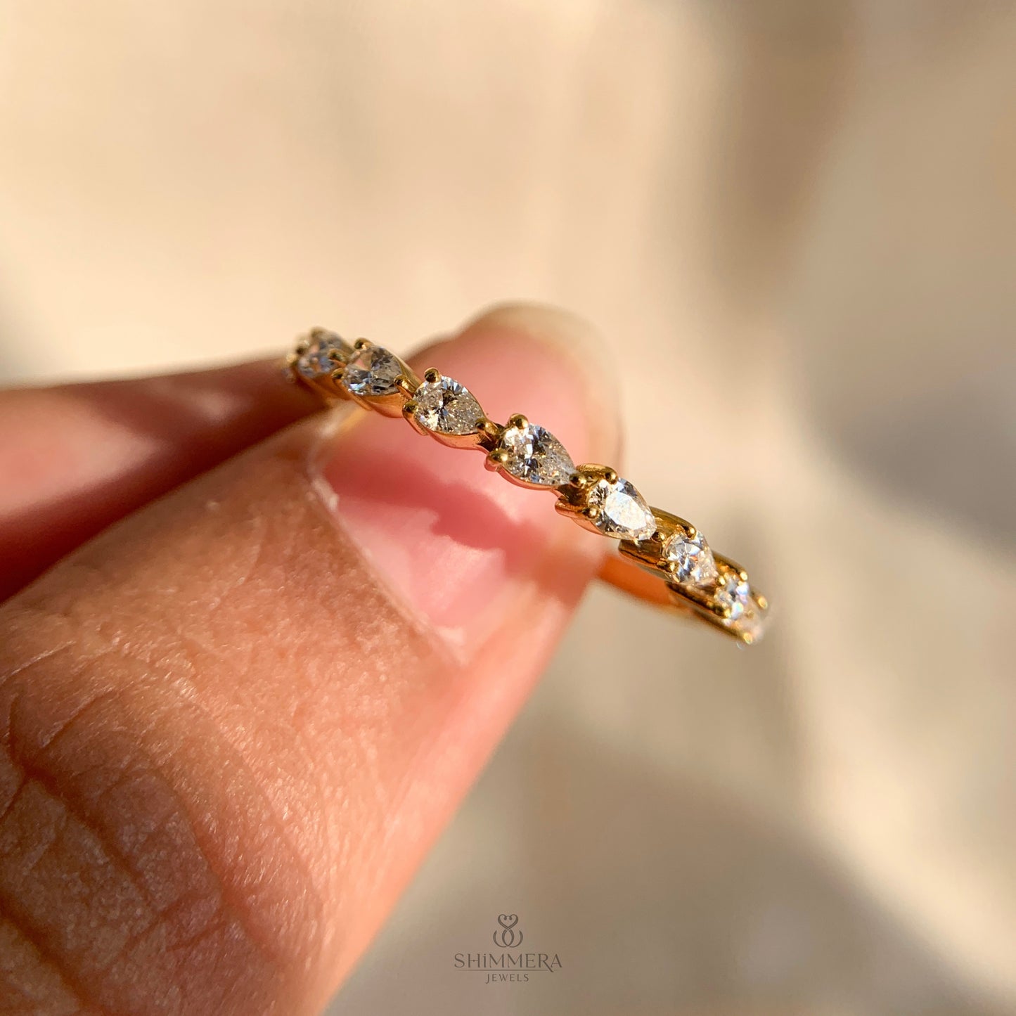 Lab created pear diamond engagement band in 14k yellow gold