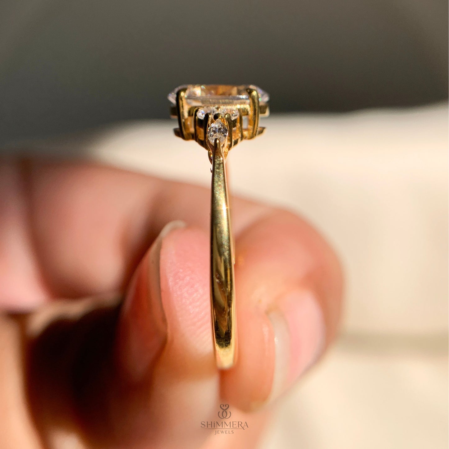 Stunning oval cut diamond ring with accent side stones