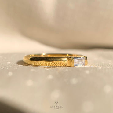 Minimalist baguette diamond band with east-west solitaire design for brides