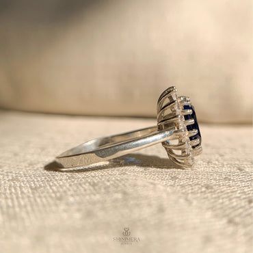 Classic oval blue sapphire engagement ring in white gold setting