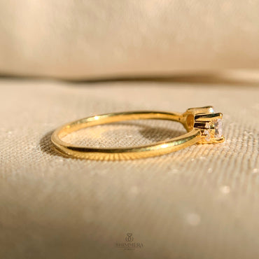 Minimalist oval diamond ring in horizontal east west design