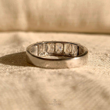 "Elegant emerald cut diamond wedding band for brides"