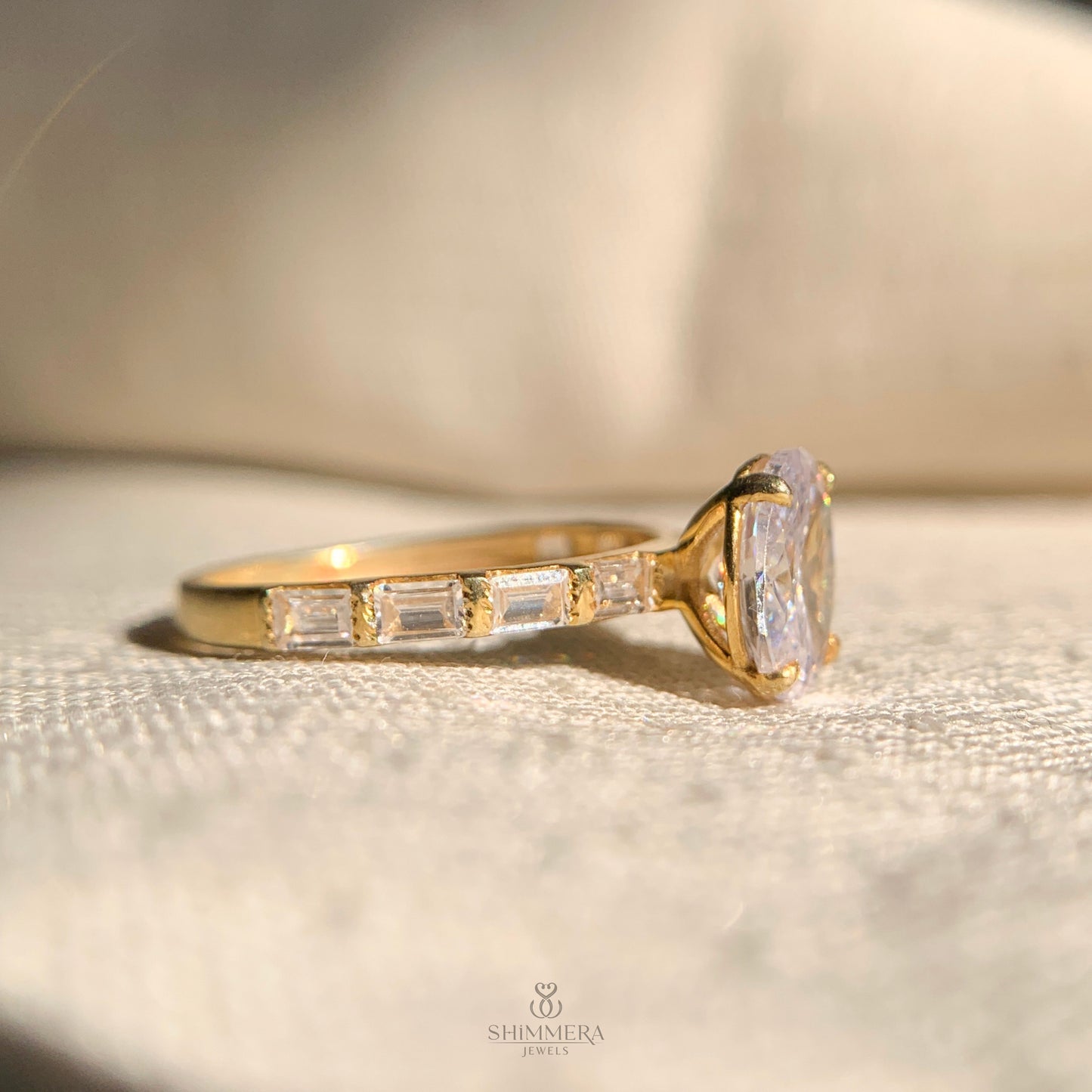 Classic moissanite oval engagement ring accented with side stones