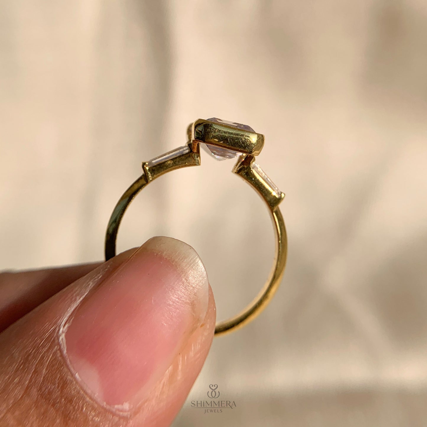 Three Stone Emerald Cut Diamond Ring