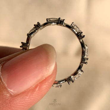 "Stackable diamond rings for women featuring marquise and round cuts"