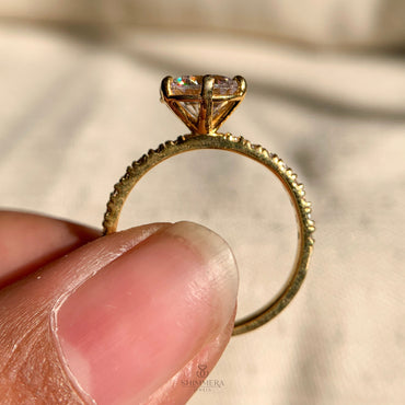 Classic round brilliant diamond engagement ring with six prong setting