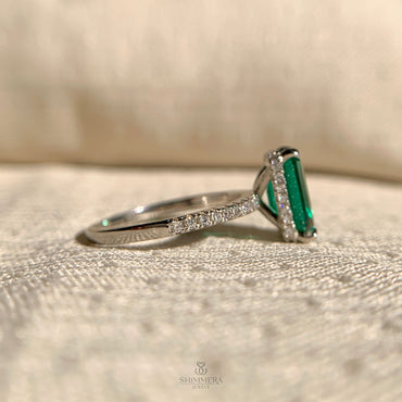 Elegant emerald radiant solitaire ring for engagement, handcrafted and available online