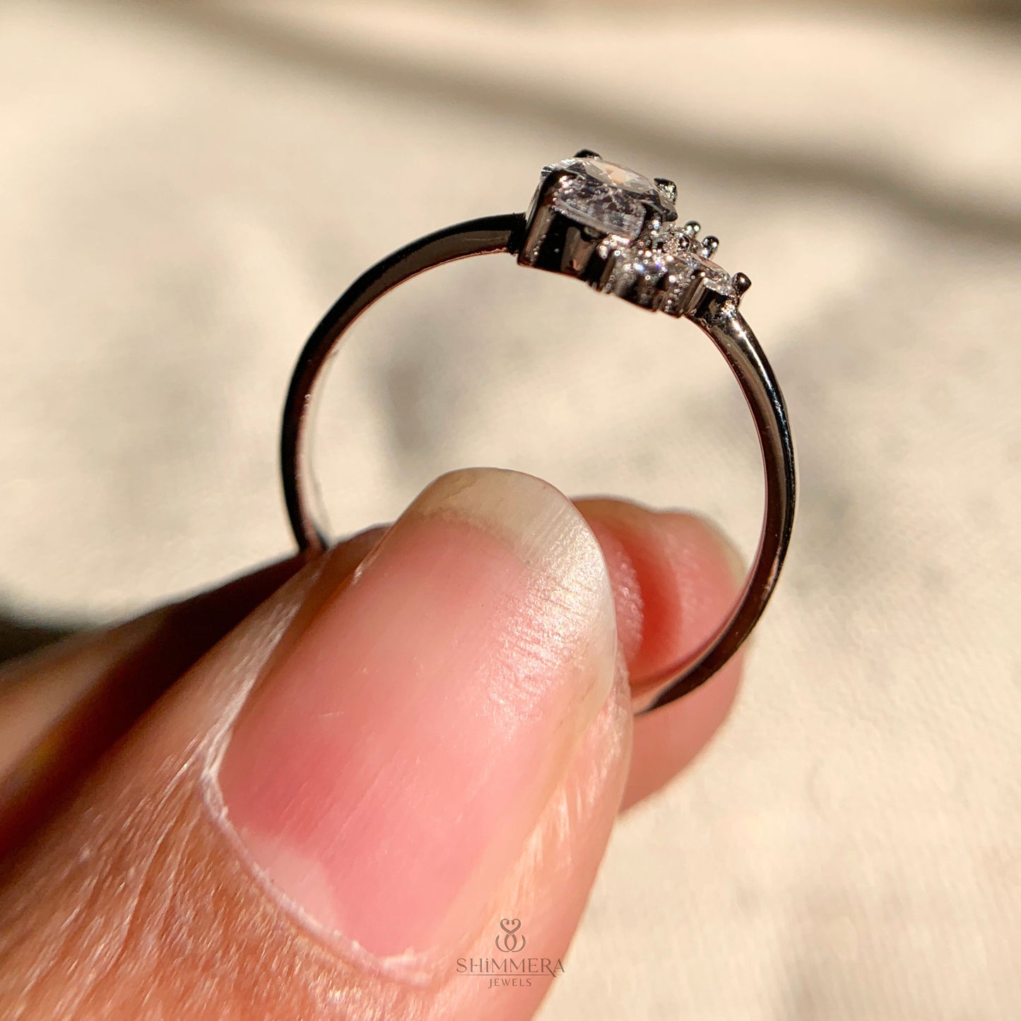 "Oval cluster engagement ring featuring 1 carat lab grown diamonds"