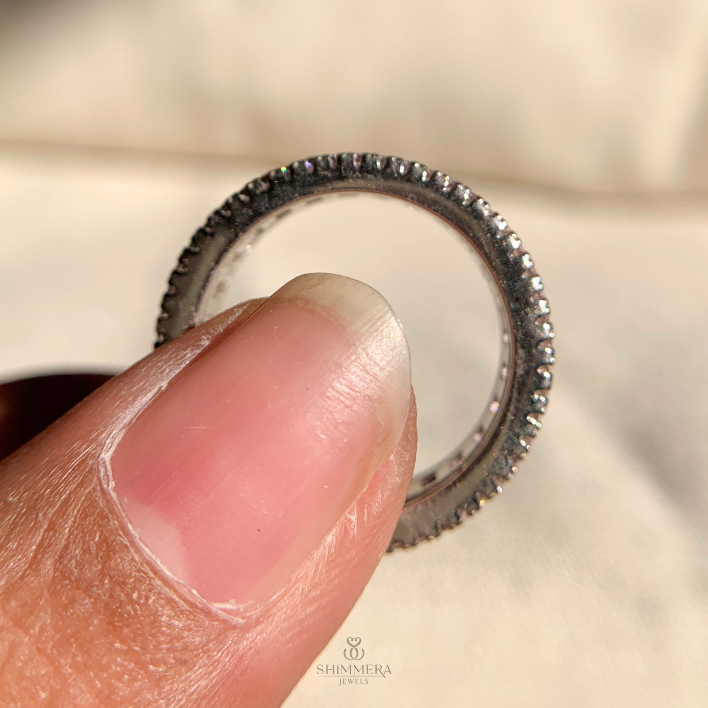 Minimalist pink baguette wedding band crafted in 14k white gold