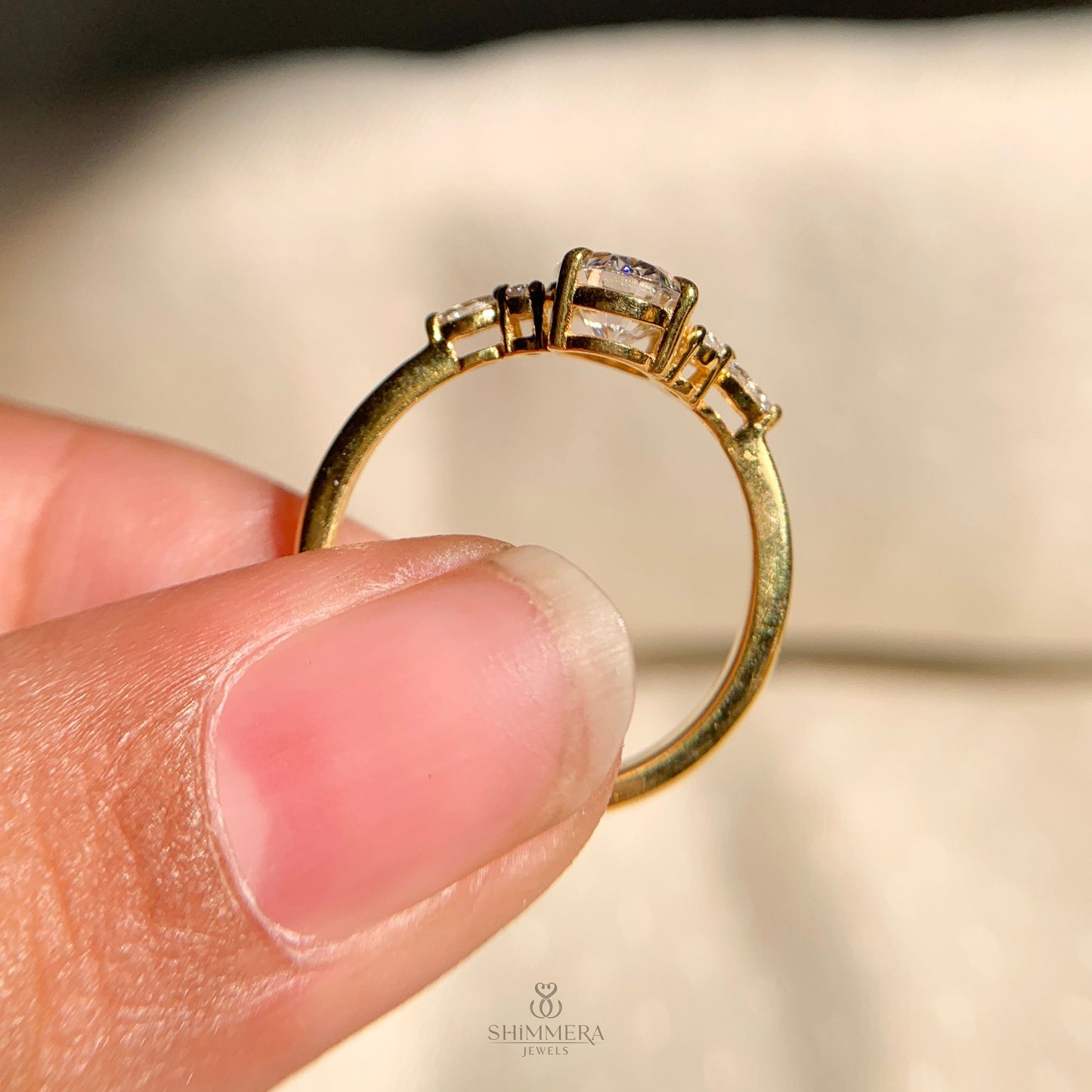 Oval cut diamond engagement ring with side stone setting for proposal