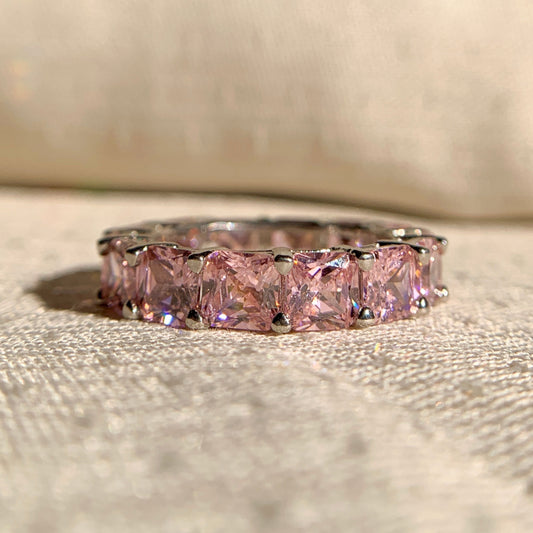 Pink princess cut diamond eternity band in sterling silver – elegant women’s wedding ring