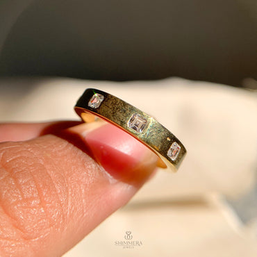 "Asscher cut diamond eternity ring made with sustainable lab grown diamonds"