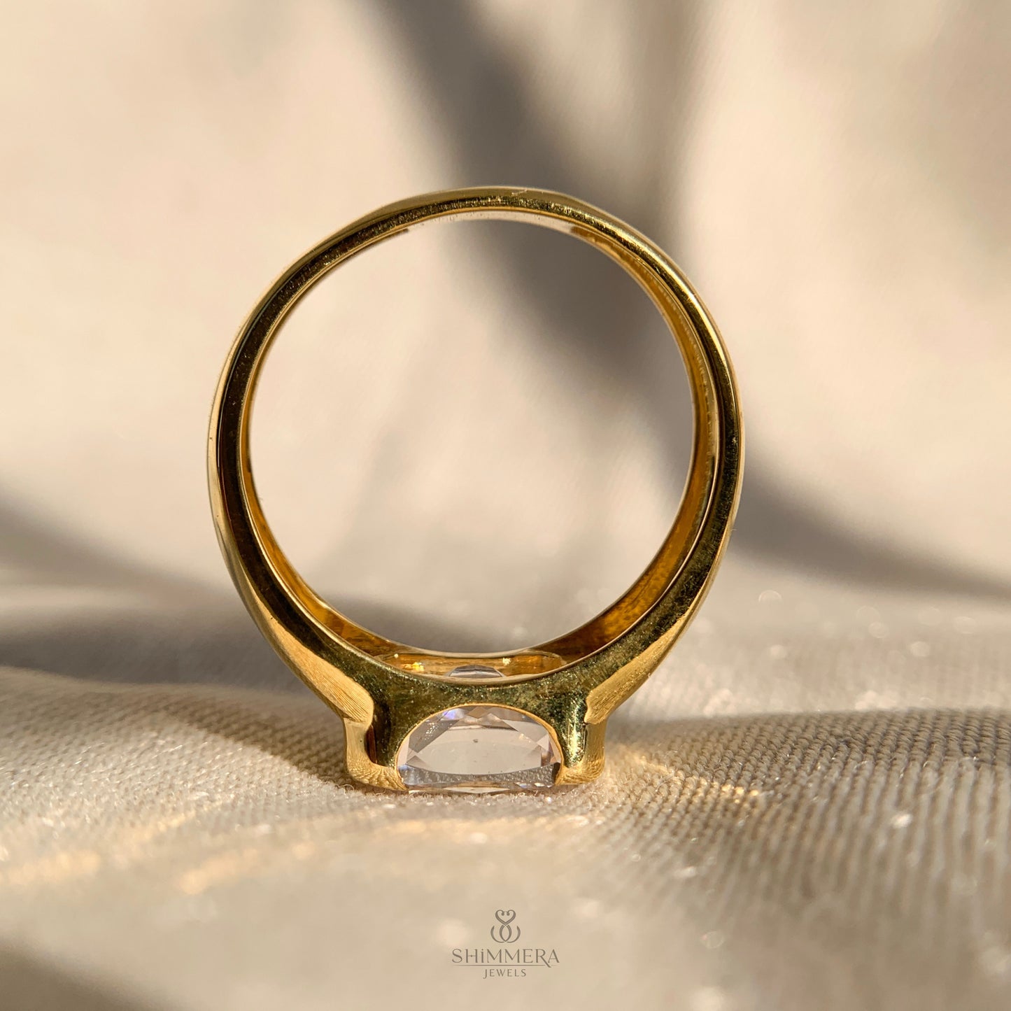 East West Radiant Cut Half Bezel Engagement Ring