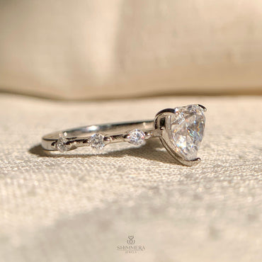 “Romantic heart shaped diamond solitaire ring in sterling silver”