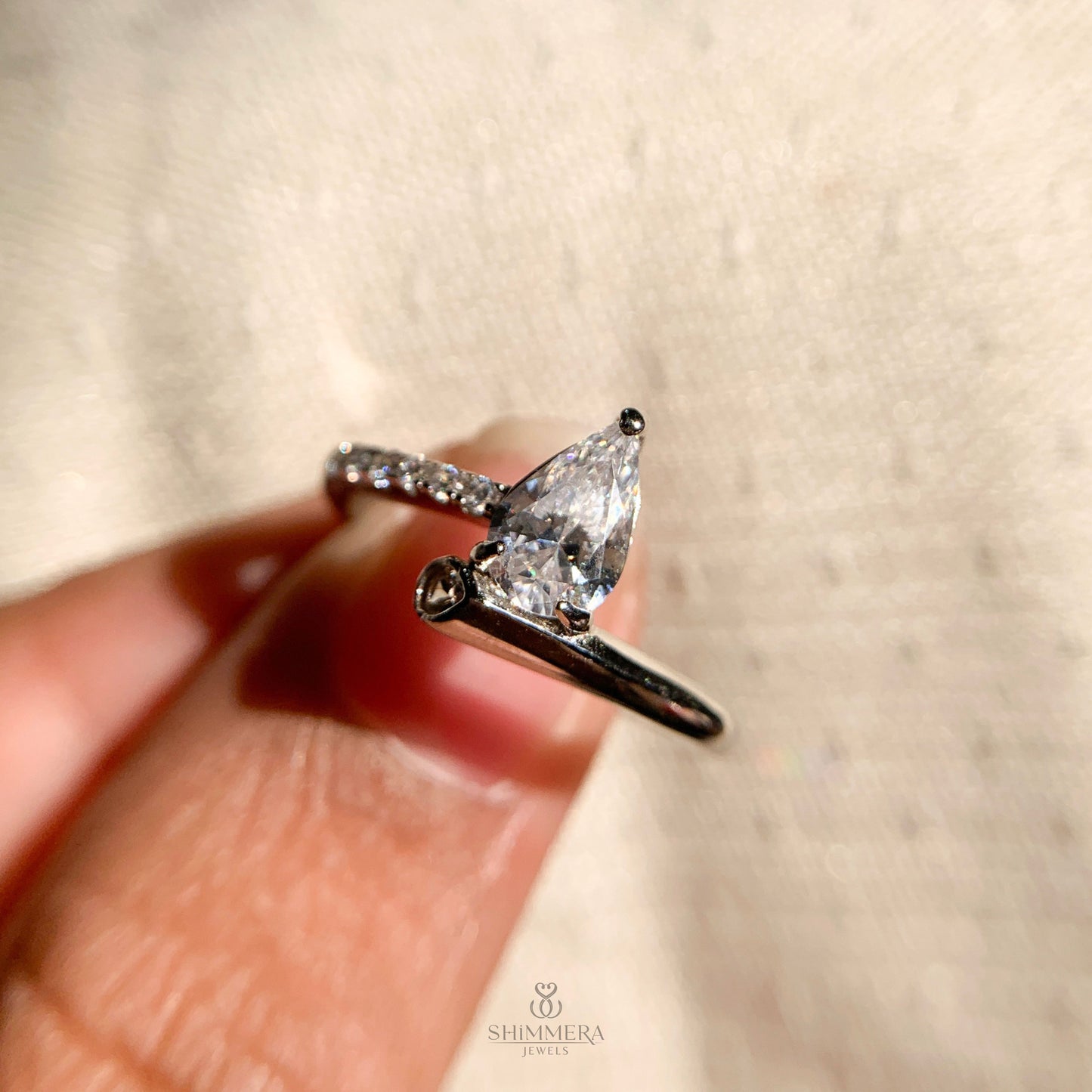 "Timeless pear cut solitaire engagement ring for her"