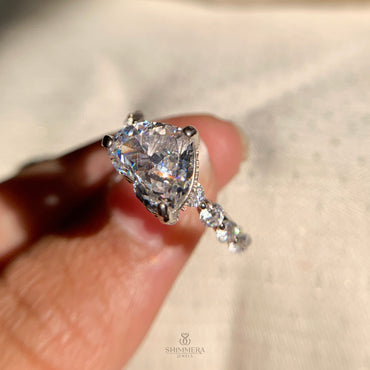 “Brilliant round lab diamond engagement ring accented by side stones in white gold”