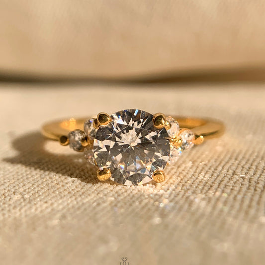 Round Cut Moissanite Engagement Ring with Side Stones in White Gold