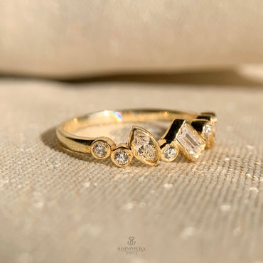 Modern bezel set diamond band with mixed stone shapes for women