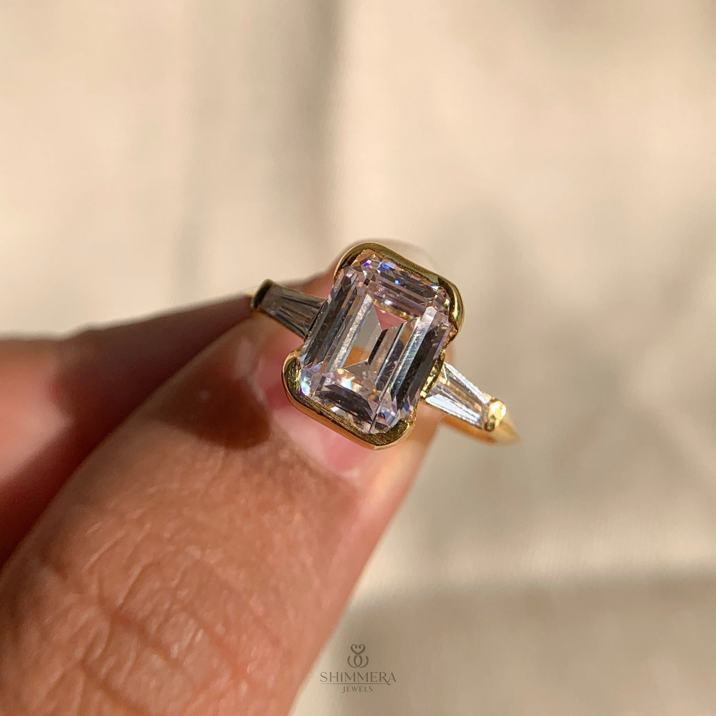 Three Stone Emerald Cut Diamond Ring
