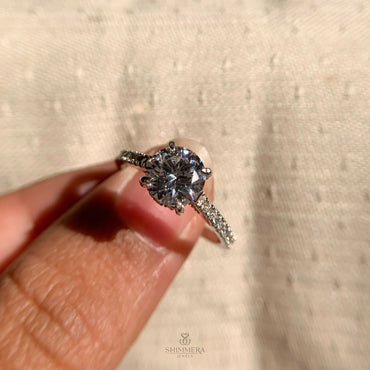 “Yellow gold engagement ring featuring 1 carat brilliant round diamond”