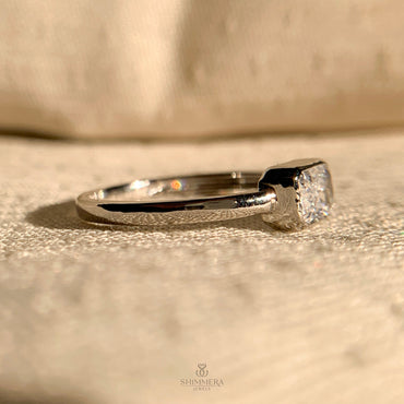 "Luxury east-west solitaire engagement ring with radiant cut diamond"