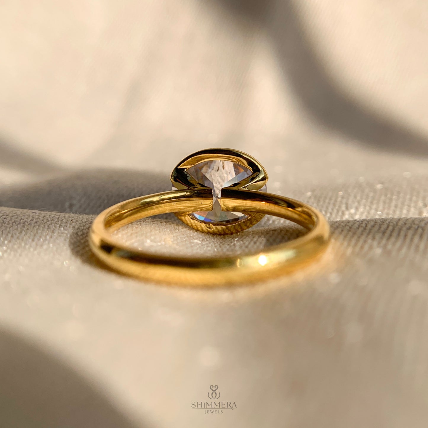 Oval Cut Half Bezel Engagement Ring