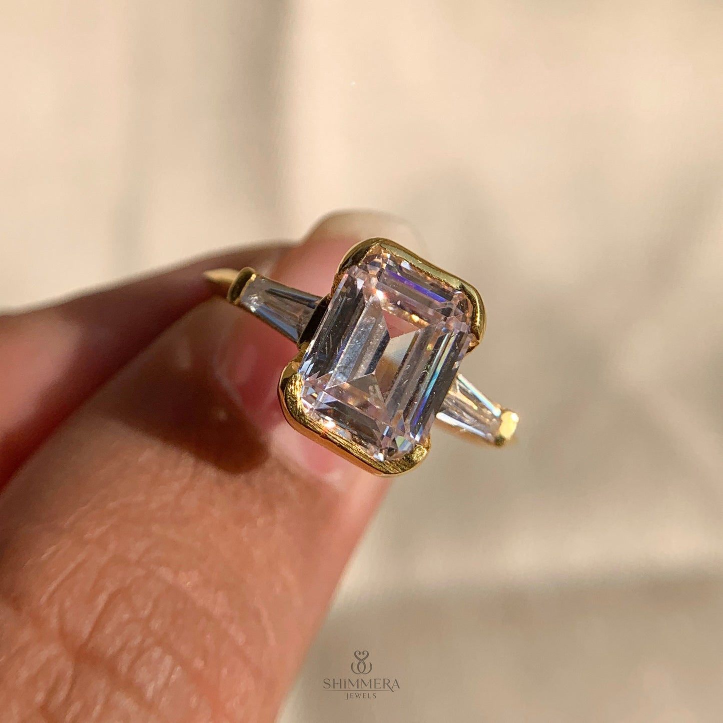 Three Stone Emerald Cut Diamond Ring
