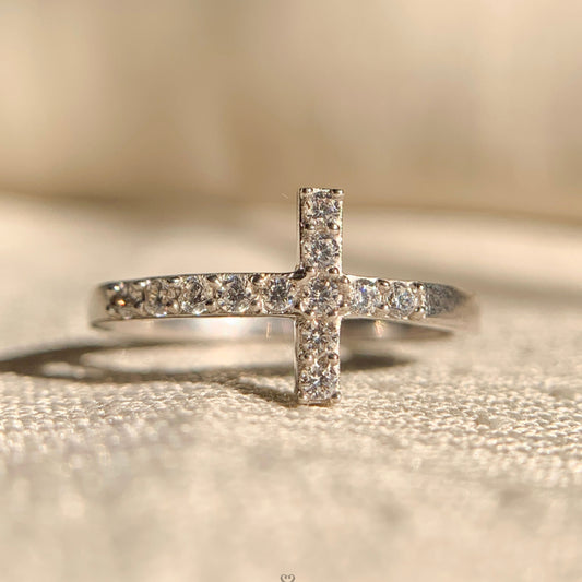Sterling silver diamond cross ring with sleek modern design