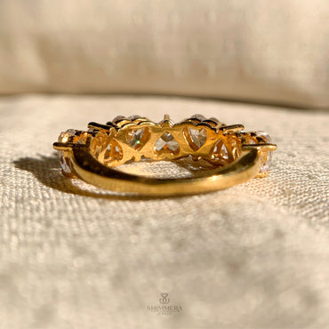 Romantic diamond wedding band with alternating heart shaped stones