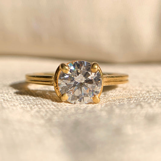 Moissanite round diamond solitaire engagement ring in white gold