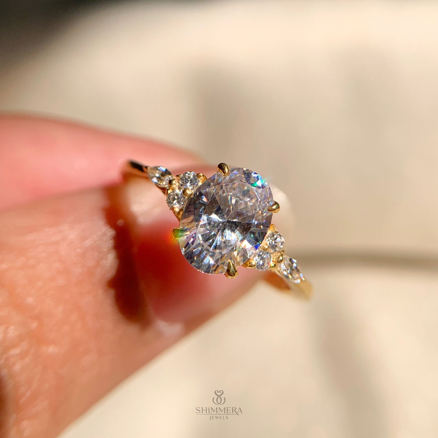 Classic oval engagement ring with side diamonds for bridal style