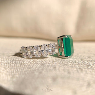 Elegant open band wedding ring with assorted diamond shapes