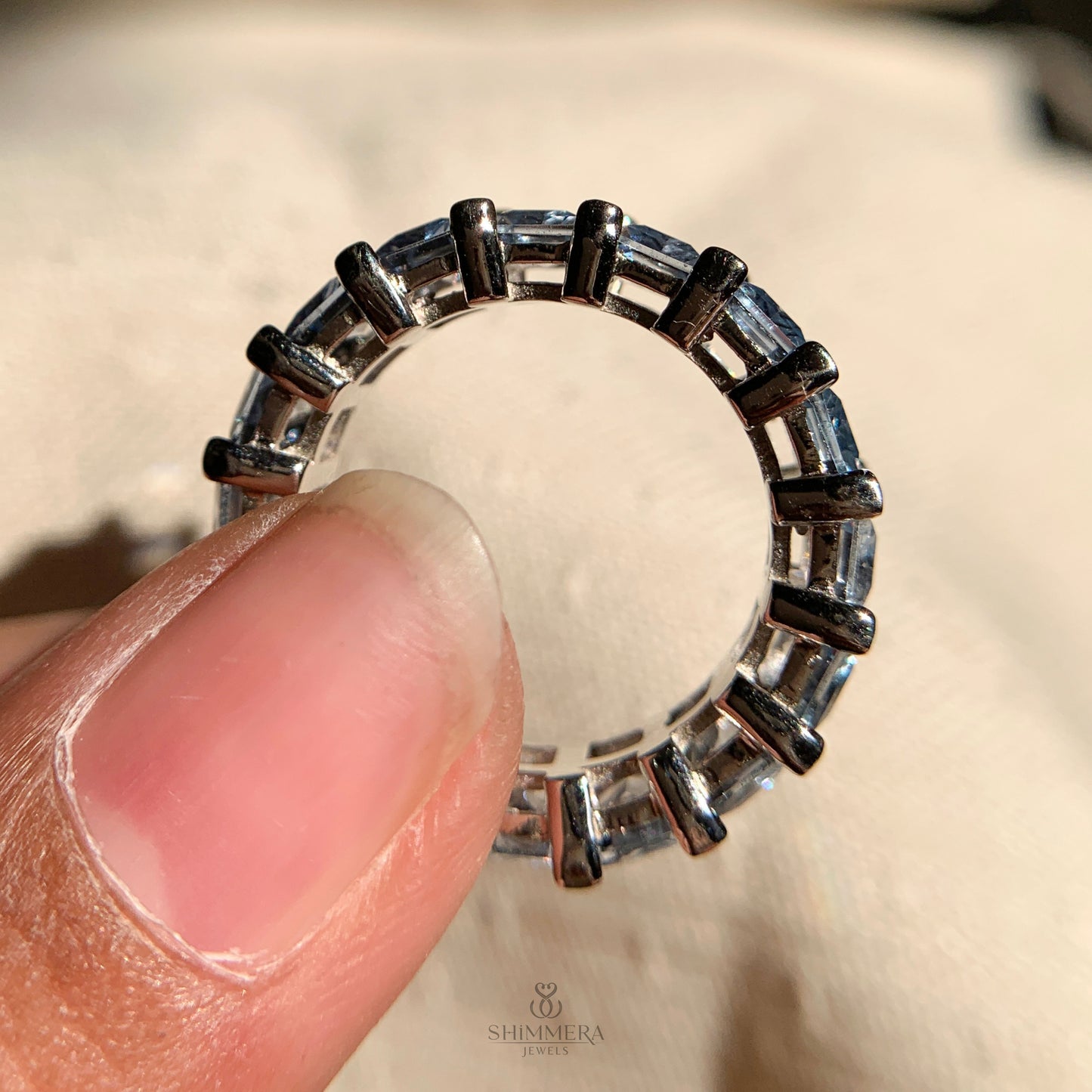 Sparkling aquamarine gemstone band in 14k rose gold