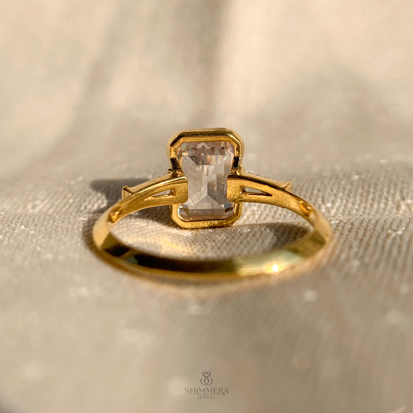 Three Stone Emerald Cut Diamond Ring
