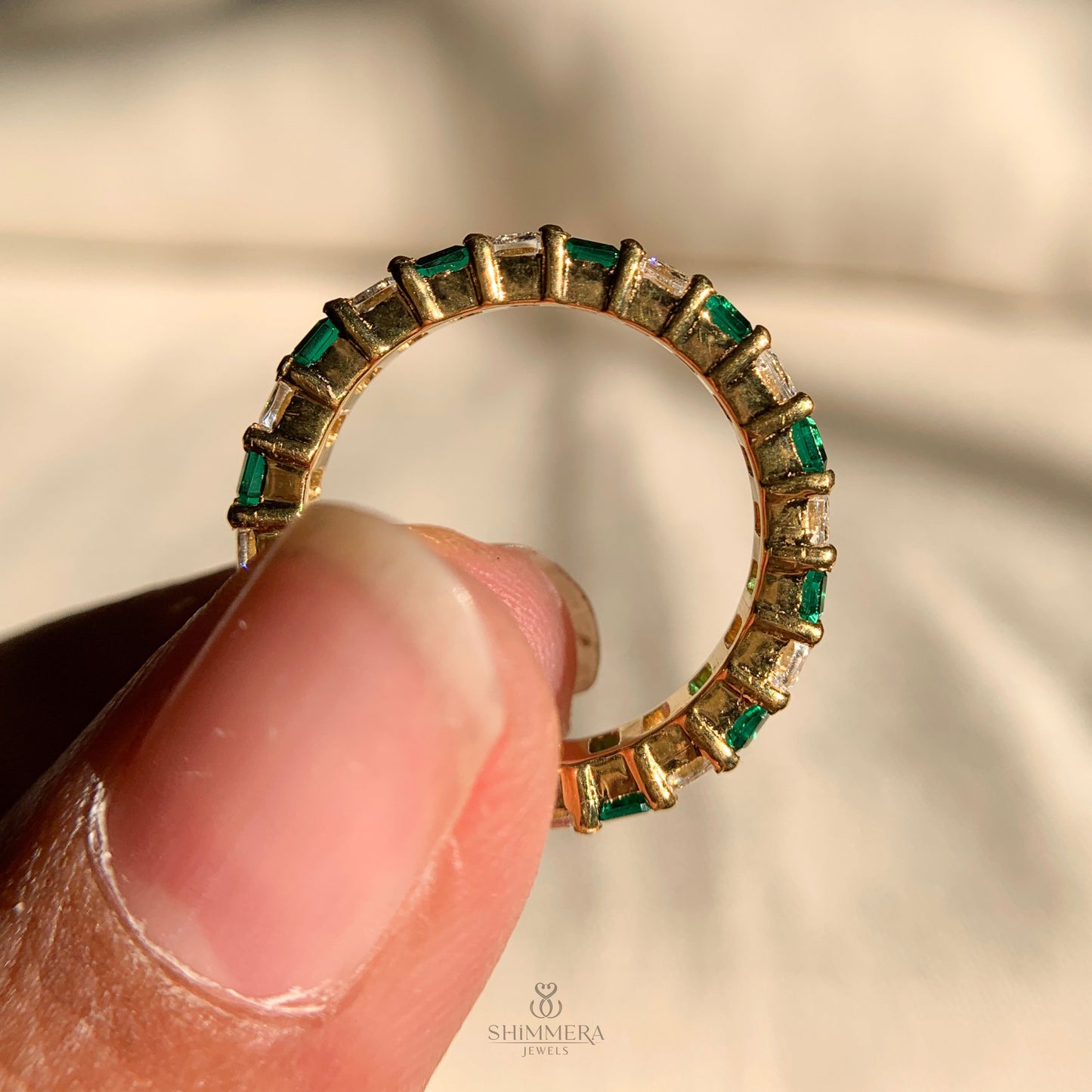 Dainty silver band with emerald cut diamonds for everyday wear