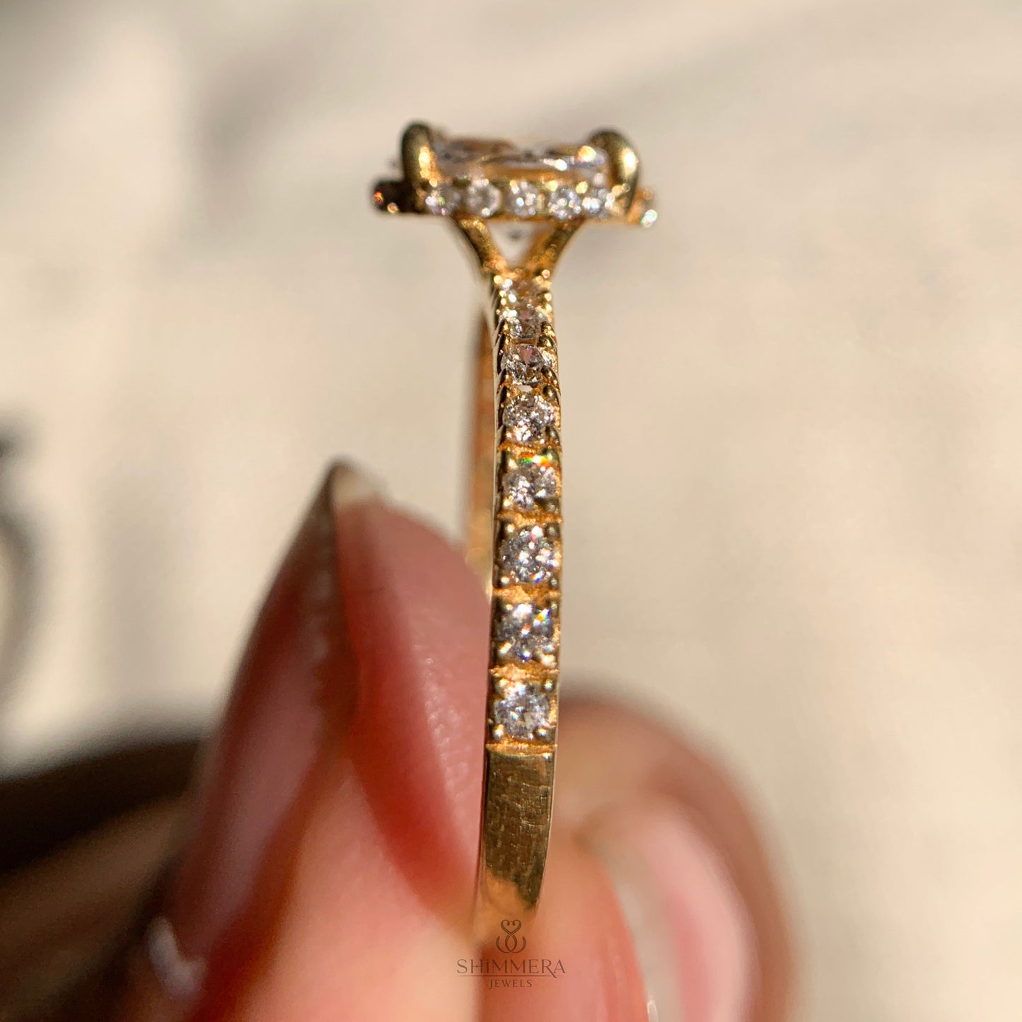 18k Hidden Halo Oval Engagement Ring with Side Stones