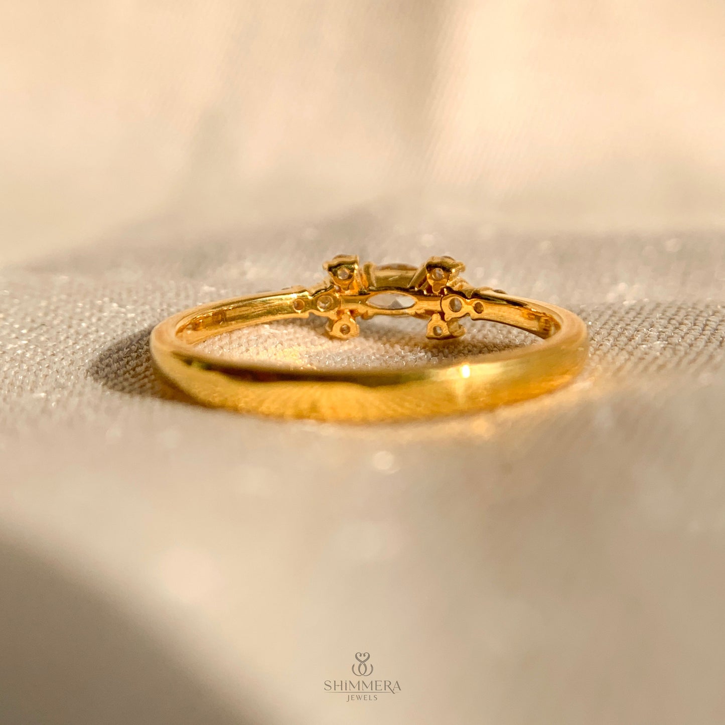 Timeless engagement ring design with marquise side stone details