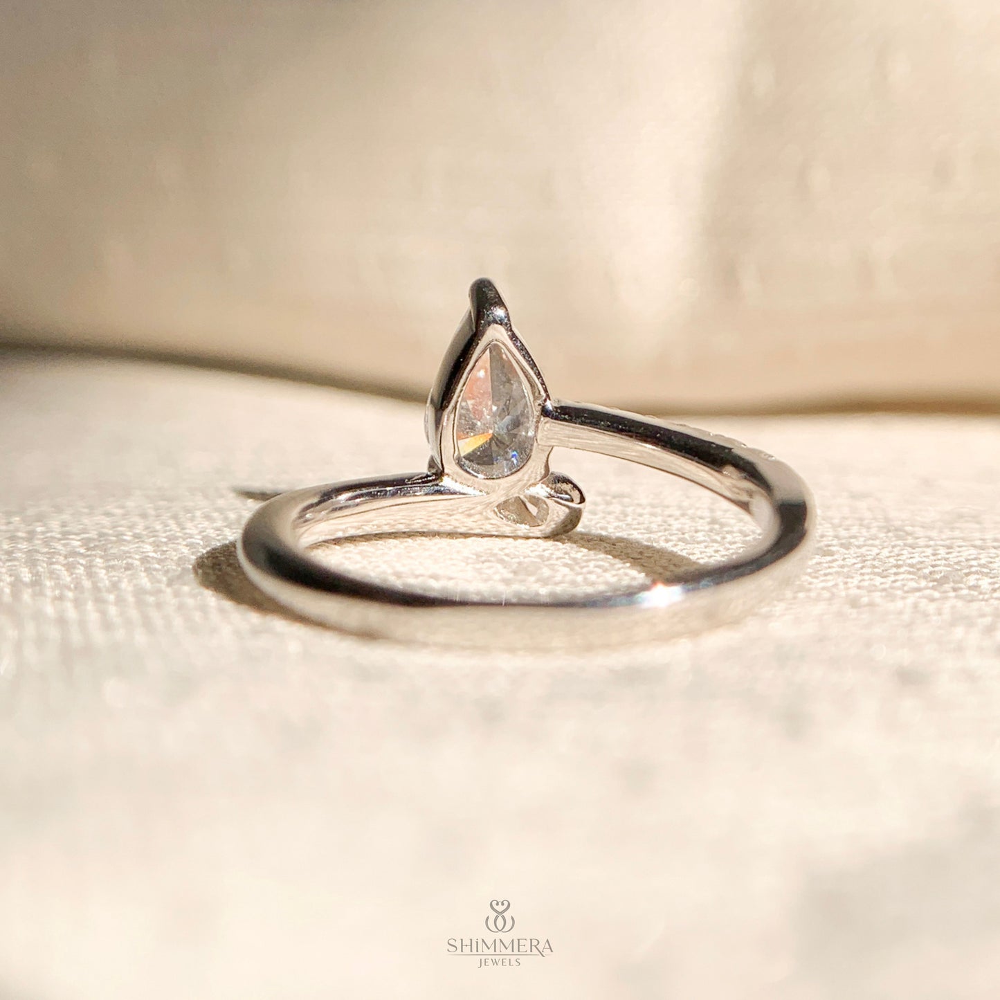 “Modern pear cut solitaire ring crafted with high clarity diamond”