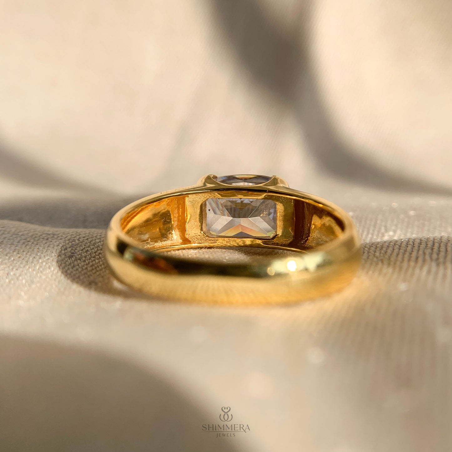 East West Radiant Cut Half Bezel Engagement Ring