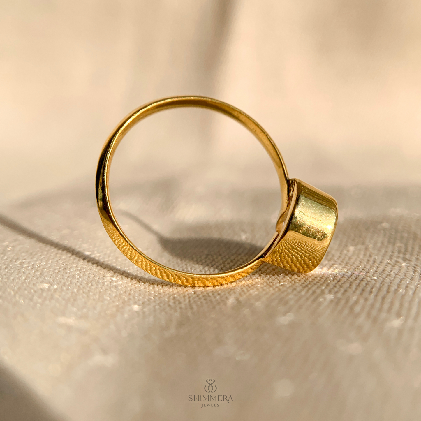 Half Bezel Pear Diamond Ring
