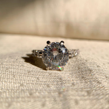 Classic solitaire engagement ring featuring Old European cut diamond