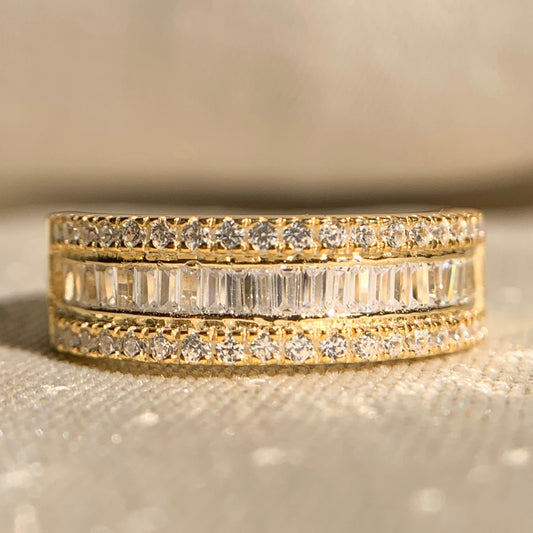 Round and baguette diamond half eternity band in white gold