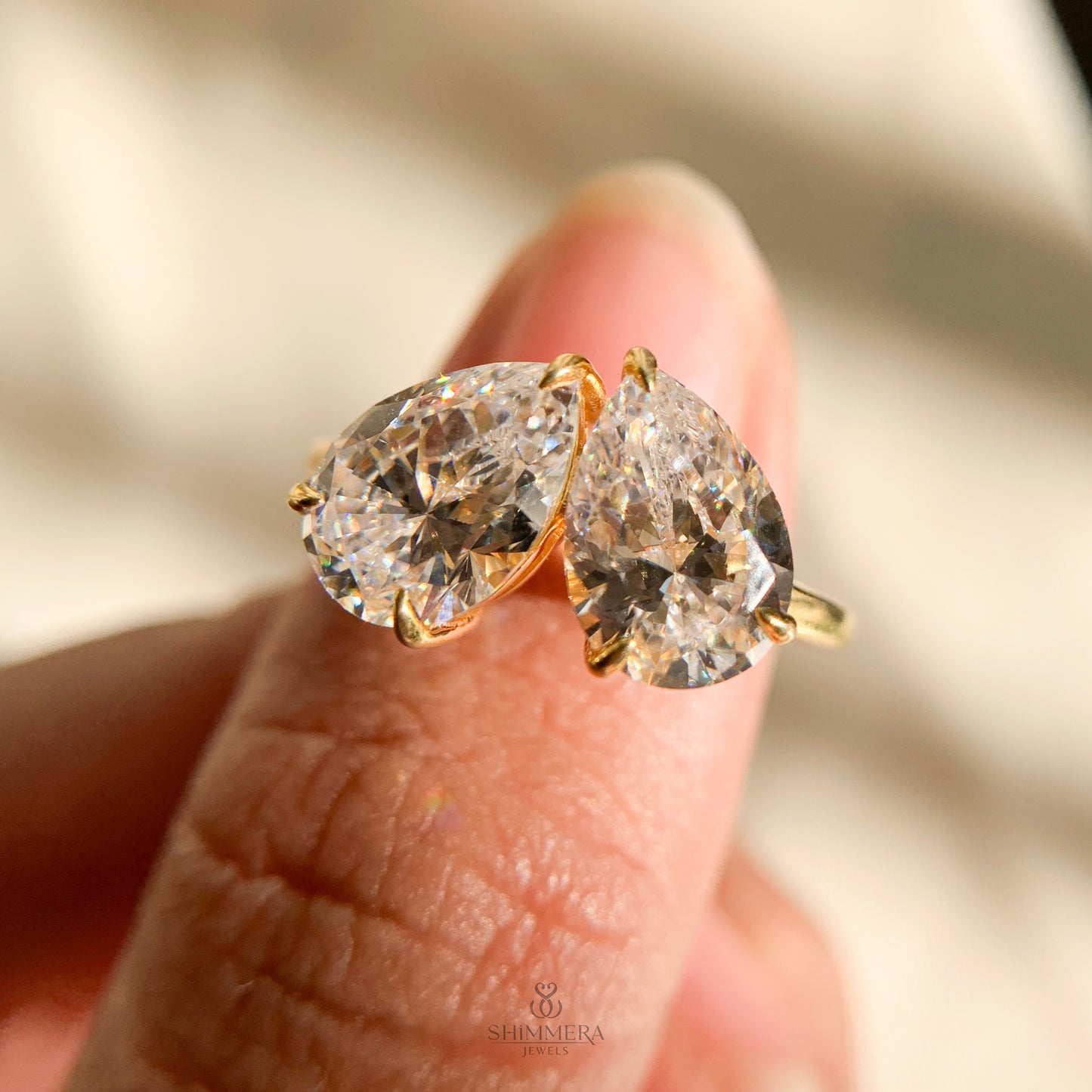 Timeless pear cut moissanite two stone engagement ring for proposals