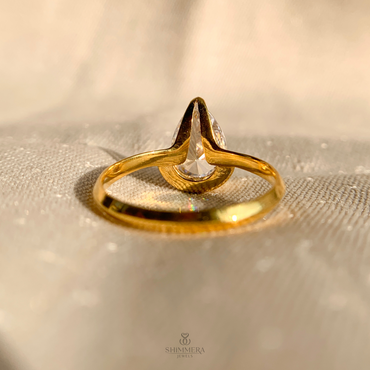 Half Bezel Pear Diamond Ring