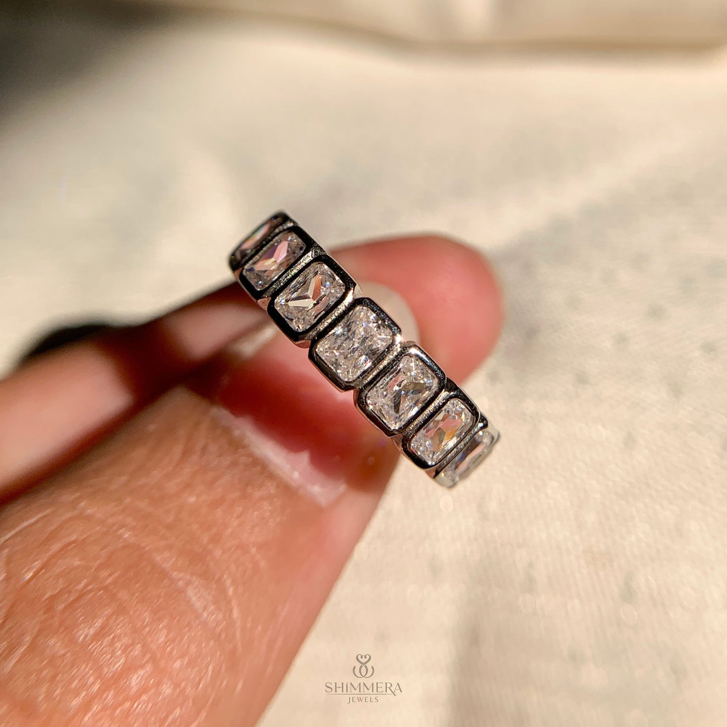 White gold radiant cut bezel set wedding band for women’s wedding jewelry