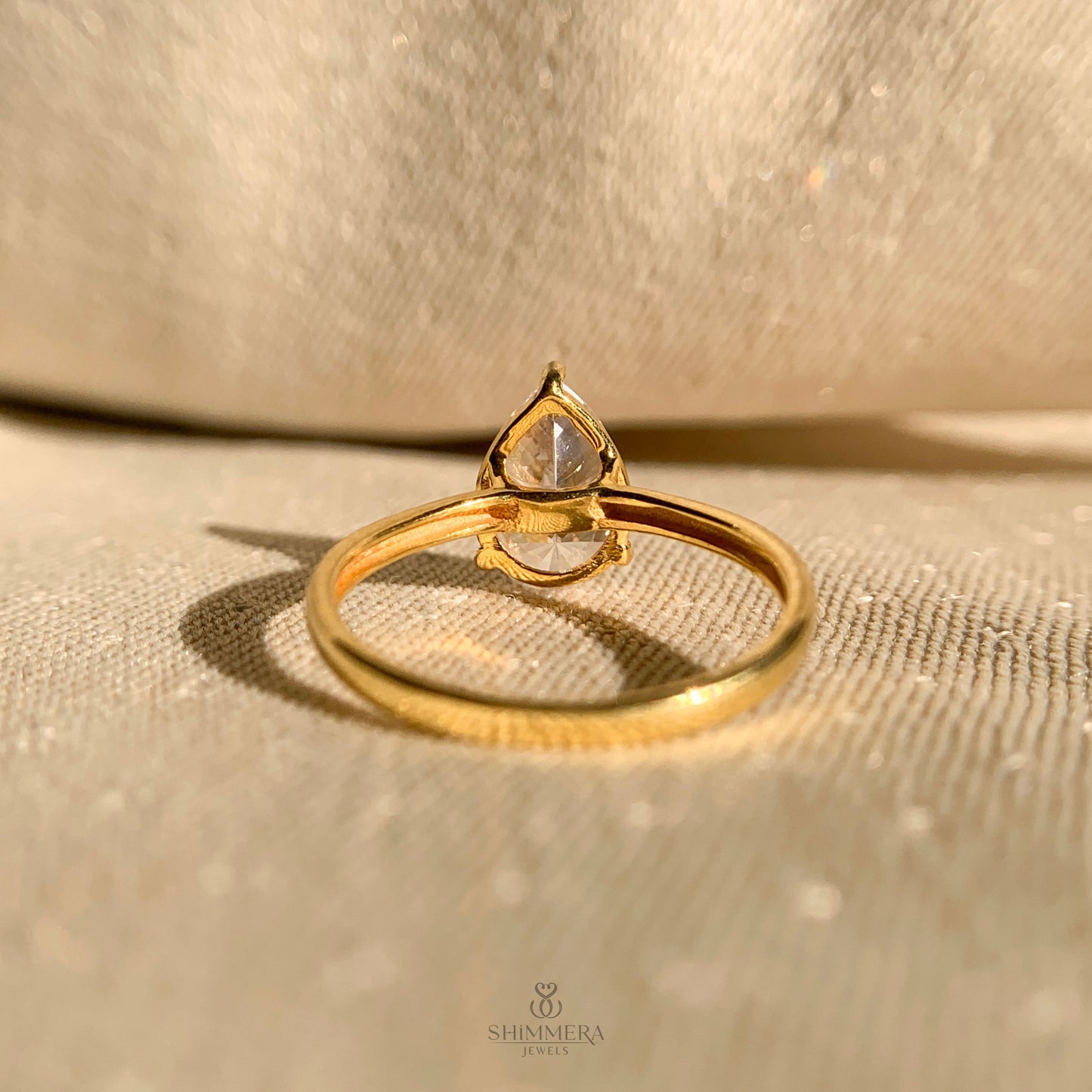 Sparkling moissanite pear solitaire ring for proposal and weddings