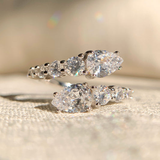 "Snake shape diamond wrap ring with graduated diamonds in 14k gold"