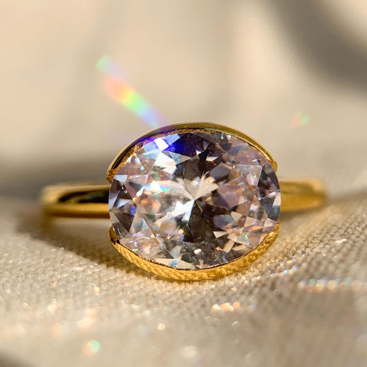 Oval Cut Half Bezel Engagement Ring